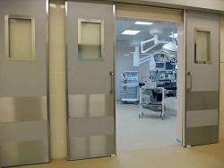Двустворчатые рентгенозащитные двери с остеклением